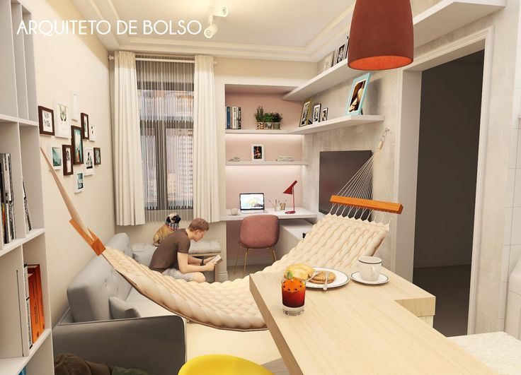 Como decorar uma sala pequena com quadros em diferentes tamanhos e posições ajudam a deixar o ambiente jovem
