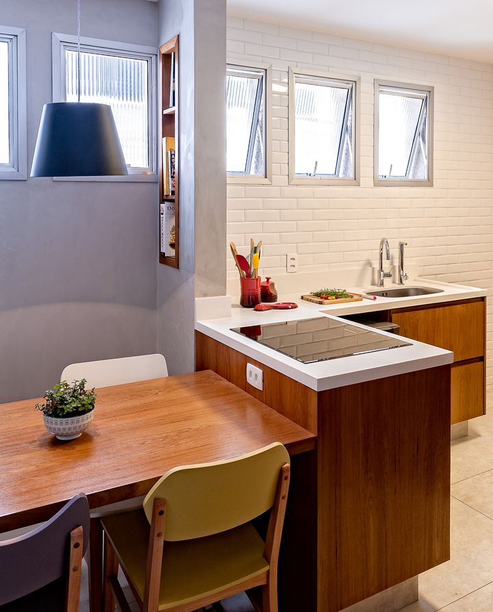 Sala e cozinha conjugadas com o mesmo décor